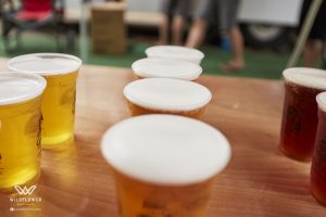 beer being served at Wildflower Experience