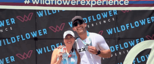 Mallory Kilmer and Trevor Franklin posing with their Wildflower Experience 2025 Finisher Medals