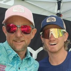 Mike Buenting and friend posing in the Rudy Project Expo Booth at the 2025 Wildflower Experience