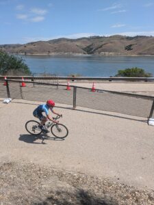 Maddie cycling at Wildflower